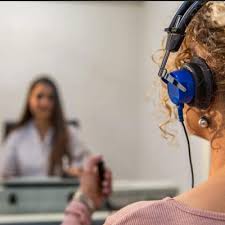 Patient wearing audiometry headphones during a hearing test at Poorvam Hearing clinic in Electronic City, Bangalore